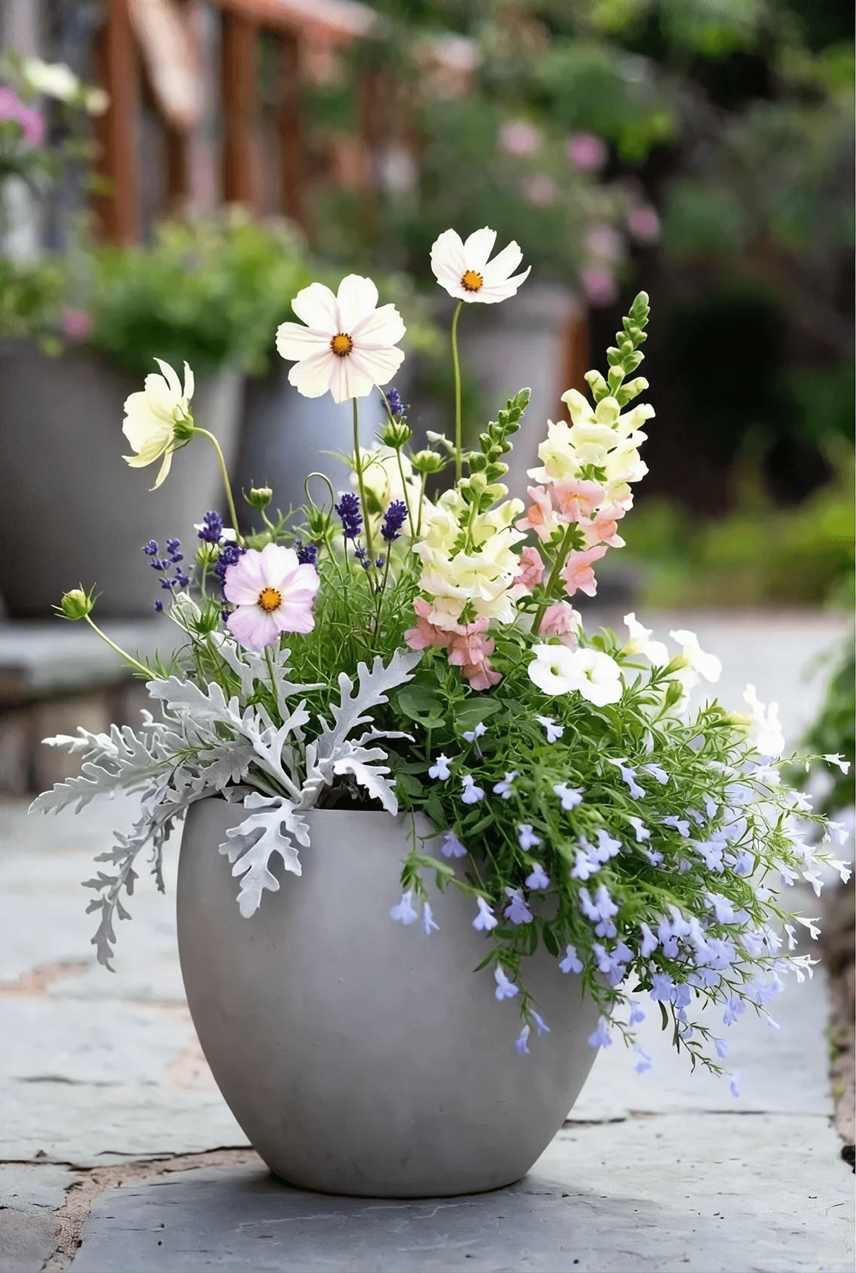 A copper planter filled with white flowers and trailing greenery